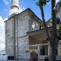 Beylerbeyi Camii - Exterior: Southwest Minaret Base, Southwest Courtyard Entrance, Quranic Inscription