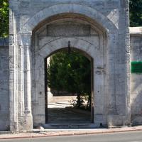 Cerrah Mehmed Pasha Camii - Exterior: Complex Entrance Portal, Engaged Columns, Recessed Entry, Quranic Inscription Above Keystone
