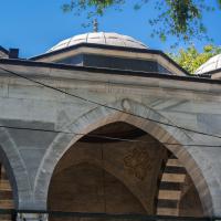 Eyup Sultan Camii - Exterior: Courtyard Arcade, Pointed Arch, Domed Bays, Ablaq Detail within Arcade, Ornamented Pendentive