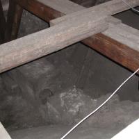 Cathédrale Notre-Dame de Paris - Interior: Roof support frame detail of wooden structure below and supported brick