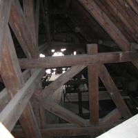 Cathédrale Notre-Dame de Paris - Interior: Roof support frame from walkway facing stained glass