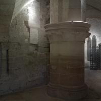 Basilique de Saint-Denis - Interior, crypt, north passage looking west, wall and column detail with entrance staircase beyond 