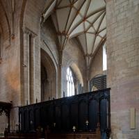 Tewkesbury Abbey - Inteior, chevet, north choir stall 
