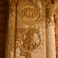 Scuola Grande della Misericordia - detail: embedded columns and insignia