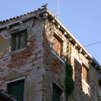 Central Venice - detail: roof, building along street in Central Venice (Rialto or San Polo)