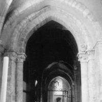 Église Notre-Dame-de-la-Nativité de Donnemarie-Dontilly - Interior, south aisle, view west into bay 6 beneath the tower, arches, and capitals from the third campaign.
